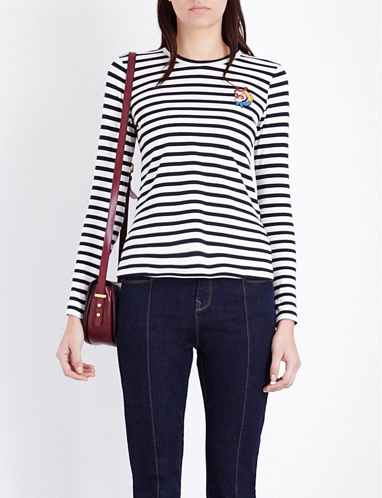 Stylish Women's Long-Sleeved T-Shirts and Tops Uptown New York meets the meandering streets of Paris in our Sabrina top. This pared down long sleeve jersey top features a chic monochrome Breton stipe, a darling peter pan collar with contrast ruffle trim, set off with a velvet ribbon tie and a sweet keyhole detail at the back neck. Casual elegance, defined/5(9).